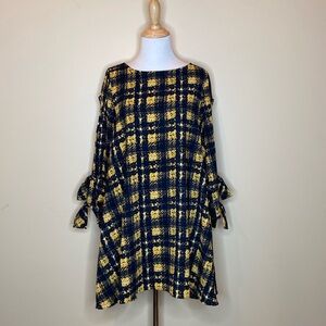 A line mini dress, bows on sleeves at wrists, size estimated (no size listed).